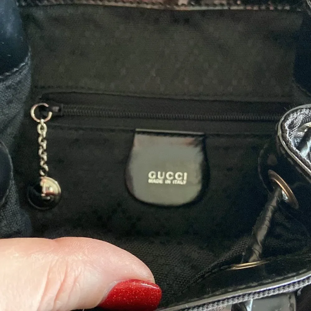 Gucci tassel oval mini backpack bambu Black impressive condition original dustba